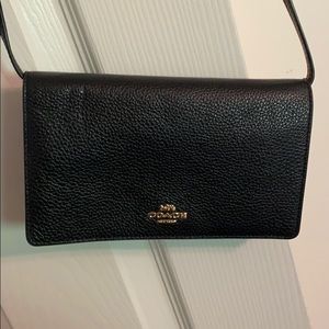 Black coach clutch with crossbody strap